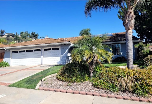2528 Windmill View Rd, El Cajon, CA 92020 - ranch-style house featuring driveway, a tiled roof, stucco siding, and an attached garage