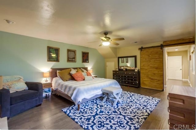 2528 Windmill View Rd, El Cajon, CA 92020 - bedroom featuring wood finished floors, a barn door, and ceiling fan