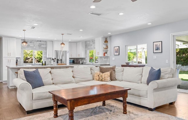 2528 Windmill View Rd, El Cajon, CA 92020 - living room with hardwood / wood-style floors, plenty of natural light, recessed lighting, and a ceiling fan