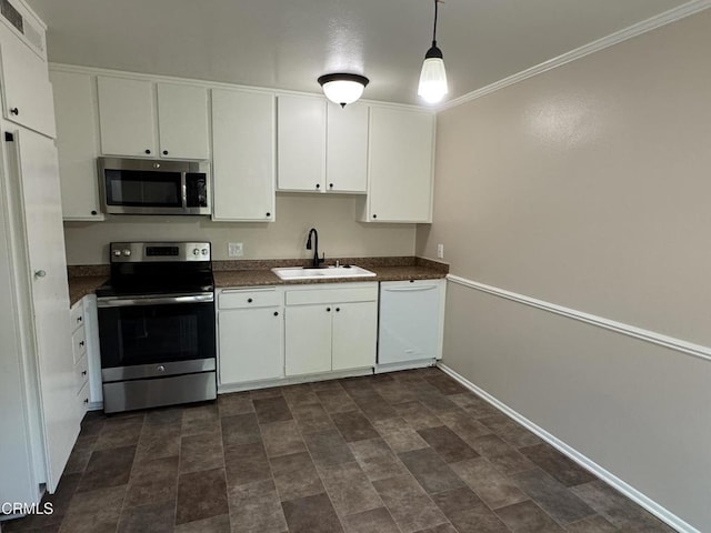 1797 E Avenida De Las Flores, Thousand Oaks, CA 91362 - kitchen featuring appliances with stainless steel finishes, a sink, dark countertops, white cabinetry, and baseboards