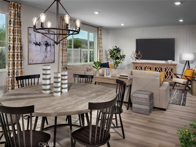 35390 Garcia St, Beaumont, CA 92223 - dining area featuring light wood finished floors, a chandelier, and recessed lighting