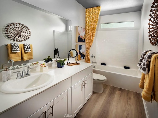 35390 Garcia St, Beaumont, CA 92223 - full bathroom featuring toilet, wood finished floors, vanity, and bathing tub / shower combination