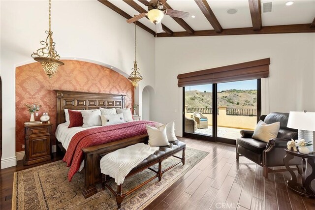 21925 Heatheridge Dr, Yorba Linda, CA 92887 - bedroom featuring arched walkways, access to exterior, wallpapered walls, beamed ceiling, and dark wood-style flooring