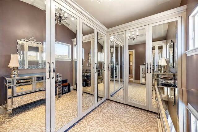 21925 Heatheridge Dr, Yorba Linda, CA 92887 - spacious closet with french doors, carpet floors, and a chandelier
