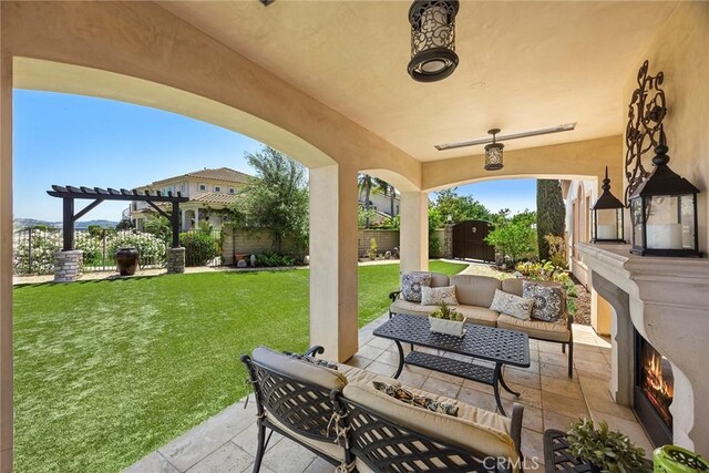 21925 Heatheridge Dr, Yorba Linda, CA 92887 - view of patio / terrace featuring an outdoor living space with a fireplace, a pergola, and a storage shed