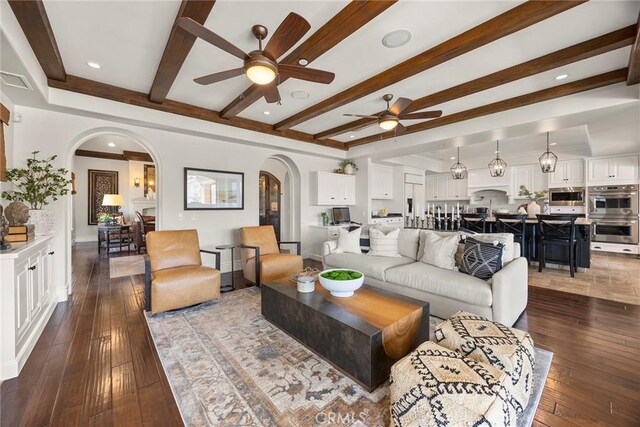 21925 Heatheridge Dr, Yorba Linda, CA 92887 - living room with arched walkways, ceiling fan, beam ceiling, dark wood-type flooring, and recessed lighting