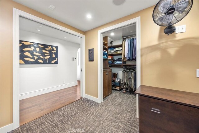 21925 Heatheridge Dr, Yorba Linda, CA 92887 - corridor featuring baseboards, arched walkways, wood finished floors, and recessed lighting