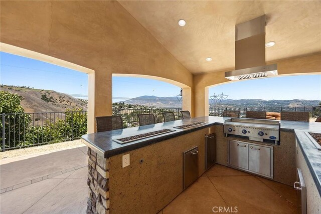 21925 Heatheridge Dr, Yorba Linda, CA 92887 - view of patio / terrace with a mountain view and an outdoor kitchen