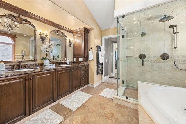 21925 Heatheridge Dr, Yorba Linda, CA 92887 - full bathroom featuring a stall shower, double vanity, a whirlpool tub, vaulted ceiling, and baseboards