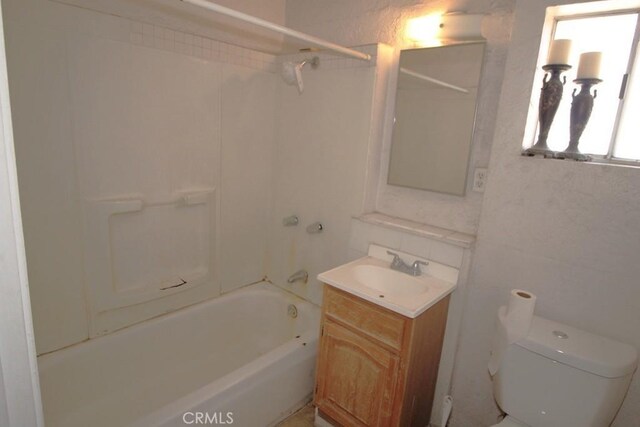 120 W Williams St, Barstow, CA 92311 - full bathroom featuring vanity, bathtub / shower combination, and toilet