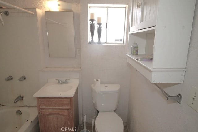 120 W Williams St, Barstow, CA 92311 - bathroom featuring vanity, toilet, and bathtub / shower combination