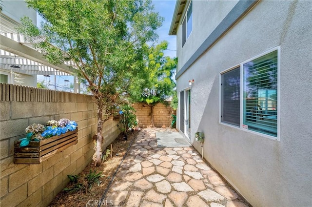 5612 Sprague Ave, Cypress, CA 90630 - fenced backyard featuring a patio area