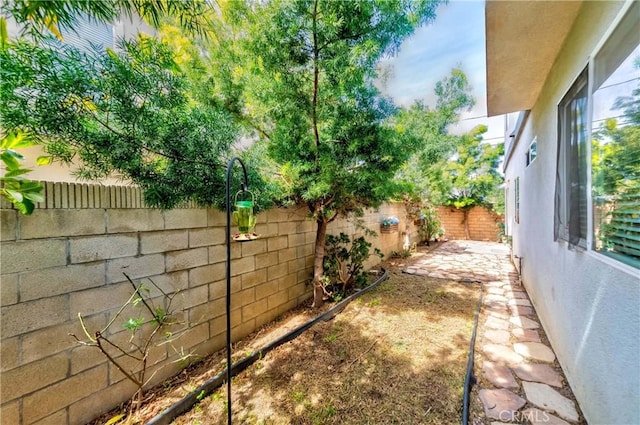 5612 Sprague Ave, Cypress, CA 90630 - fenced backyard featuring a patio