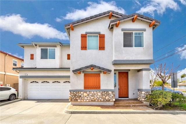 5612 Sprague Ave, Cypress, CA 90630 - view of front of house with an attached garage, stucco siding, and concrete driveway