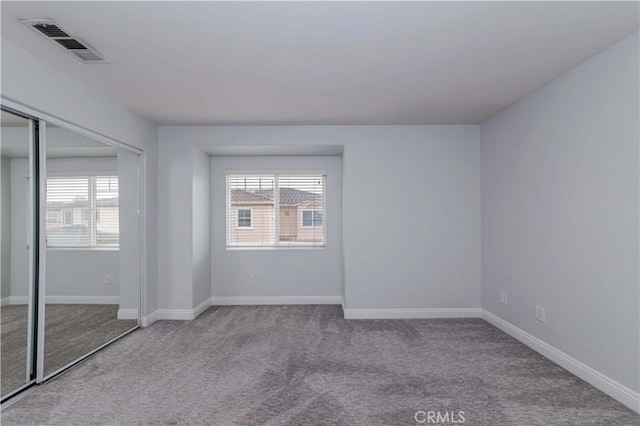 5612 Sprague Ave, Cypress, CA 90630 - unfurnished bedroom with carpet flooring, multiple windows, and baseboards