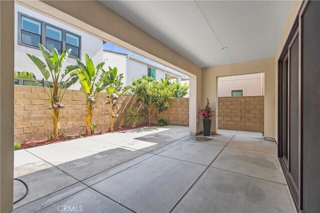 370 Sawbuck, Irvine, CA 92618 - fenced backyard featuring a patio area