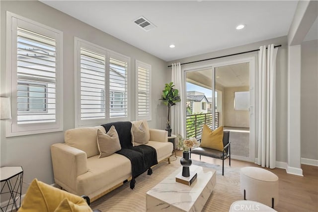 370 Sawbuck, Irvine, CA 92618 - living area with wood finished floors, baseboards, and recessed lighting