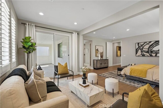 370 Sawbuck, Irvine, CA 92618 - bedroom with multiple windows, light wood-style flooring, access to outside, recessed lighting, and baseboards
