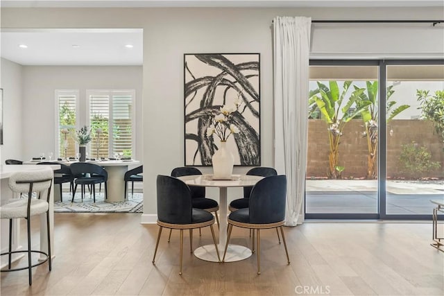 370 Sawbuck, Irvine, CA 92618 - dining space with wood finished floors, recessed lighting, and baseboards