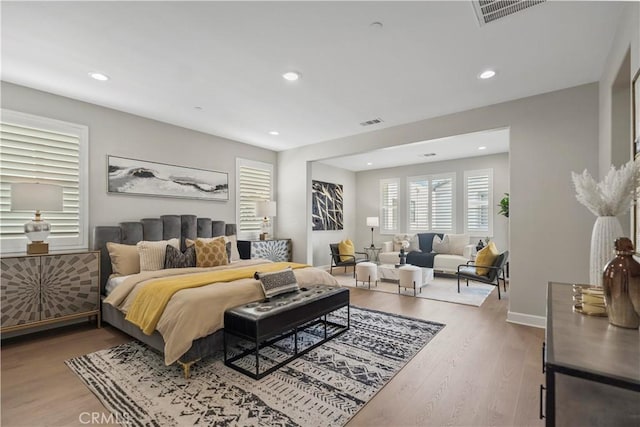 370 Sawbuck, Irvine, CA 92618 - bedroom featuring recessed lighting, wood finished floors, and baseboards