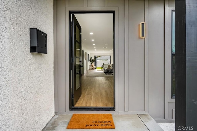 5161 E 27th St, Long Beach, CA 90815 - entrance to property with stucco siding and board and batten siding