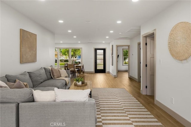 5161 E 27th St, Long Beach, CA 90815 - living area featuring recessed lighting and light wood finished floors