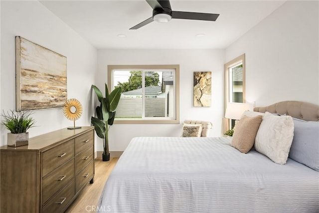 5161 E 27th St, Long Beach, CA 90815 - bedroom featuring light wood-style flooring and a ceiling fan