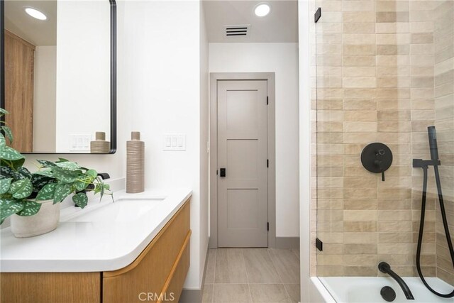 5161 E 27th St, Long Beach, CA 90815 - bathroom featuring vanity, shower / tub combination, and recessed lighting