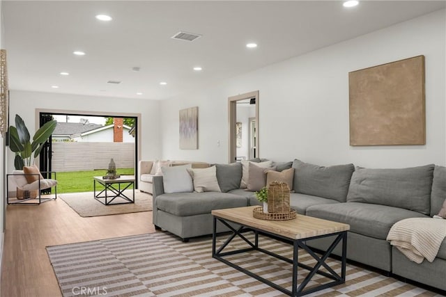 5161 E 27th St, Long Beach, CA 90815 - living room featuring recessed lighting and light wood-style flooring