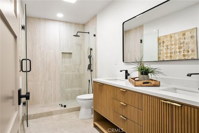 5161 E 27th St, Long Beach, CA 90815 - full bathroom with double vanity, a shower stall, and tile patterned floors