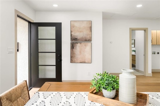 5161 E 27th St, Long Beach, CA 90815 - foyer entrance with light wood-style flooring and recessed lighting