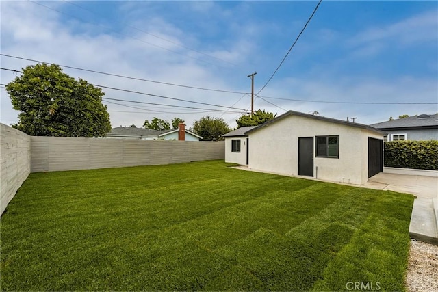 5161 E 27th St, Long Beach, CA 90815 - fenced backyard featuring driveway