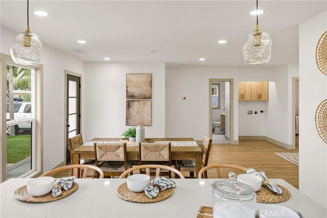 5161 E 27th St, Long Beach, CA 90815 - dining space with light wood-style floors and recessed lighting