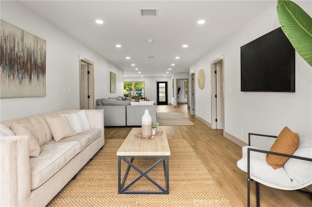 5161 E 27th St, Long Beach, CA 90815 - living room featuring recessed lighting and light wood-type flooring