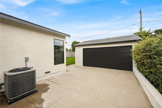 5161 E 27th St, Long Beach, CA 90815 - view of patio / terrace featuring a garage and an outdoor structure