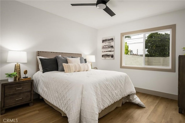 5161 E 27th St, Long Beach, CA 90815 - bedroom with wood finished floors and a ceiling fan