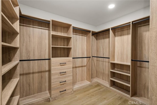 5161 E 27th St, Long Beach, CA 90815 - spacious closet featuring wood finished floors