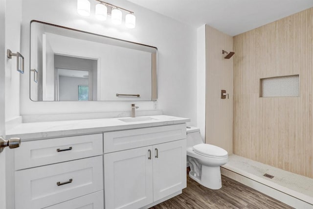 6362 Rancho Mission Rd Unit 712, San Diego, CA 92108 - bathroom with a stall shower, toilet, vanity, and wood finished floors
