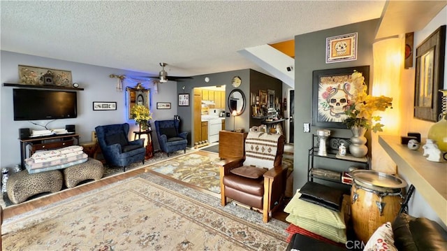 8601 Burnet Ave Unit D, North Hills, CA 91343 - living area with ceiling fan, a textured ceiling, and wood finished floors