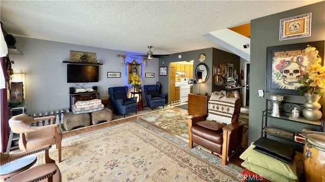 8601 Burnet Ave Unit D, North Hills, CA 91343 - living room with a textured ceiling, ceiling fan, and wood finished floors