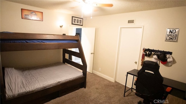6384 E Lowe Ave, Fresno, CA 93727 - bedroom featuring carpet flooring and a textured ceiling