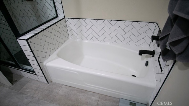6384 E Lowe Ave, Fresno, CA 93727 - bathroom featuring a garden tub, a shower, and tile patterned flooring