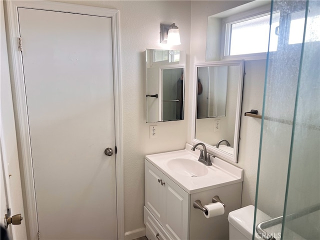3751 Ketch Ave Unit D, Oxnard, CA 93035 - bathroom with toilet, vanity, and an enclosed shower