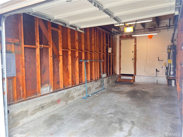 3751 Ketch Ave Unit D, Oxnard, CA 93035 - garage with gas water heater and a garage door opener