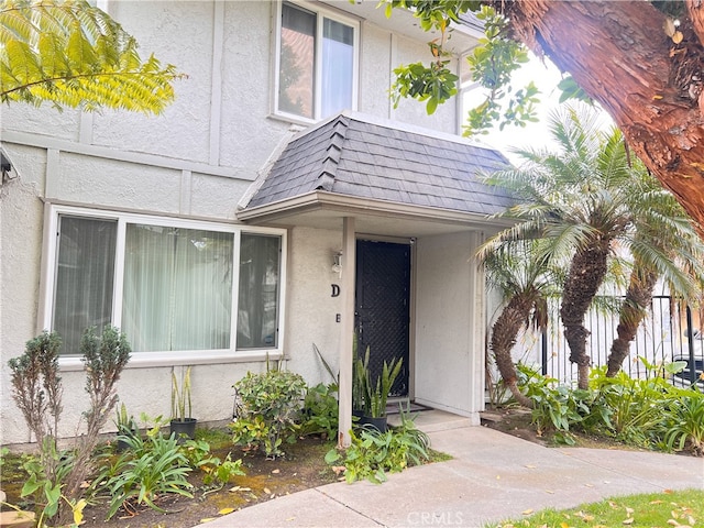 3751 Ketch Ave Unit D, Oxnard, CA 93035 - property entrance with stucco siding and a shingled roof