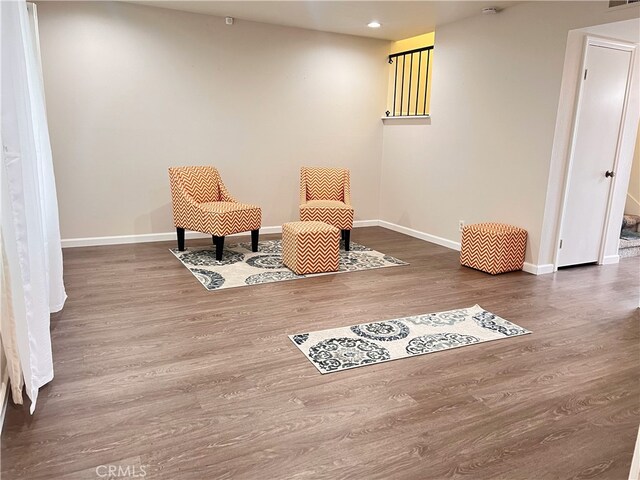 3751 Ketch Ave Unit D, Oxnard, CA 93035 - sitting room with baseboards, wood finished floors, and recessed lighting