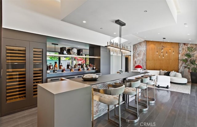 15 Torrey Pines Ln, Newport Beach, CA 92660 - community bar area with wine cooler, recessed lighting, dark wood-type flooring, and hanging light fixtures