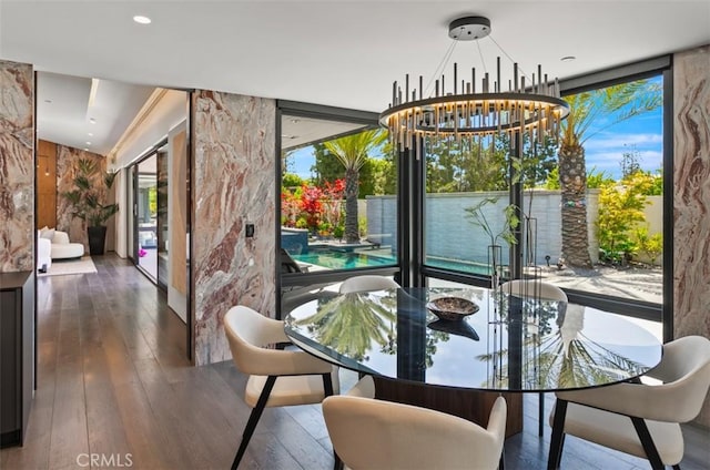 15 Torrey Pines Ln, Newport Beach, CA 92660 - dining room with a chandelier, floor to ceiling windows, healthy amount of natural light, and hardwood / wood-style flooring