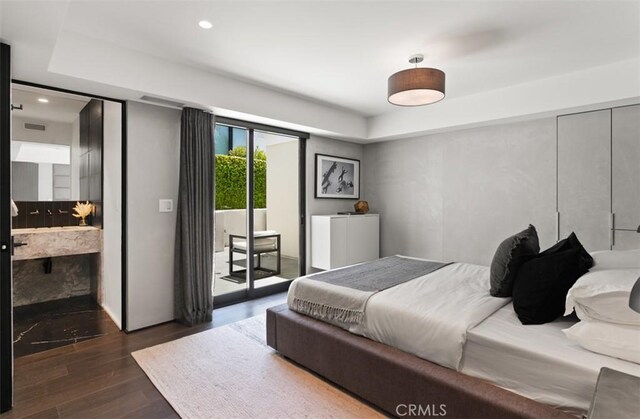 15 Torrey Pines Ln, Newport Beach, CA 92660 - bedroom with dark wood-type flooring, access to exterior, a tray ceiling, and recessed lighting