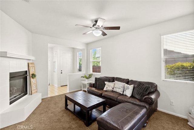 33184 Puffin St, Temecula, CA 92592 - carpeted living room featuring a ceiling fan, a tile fireplace, and baseboards